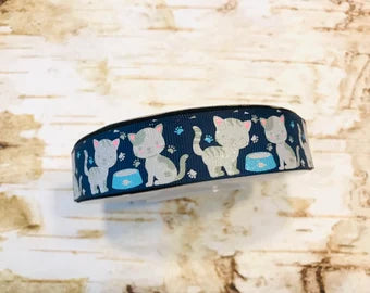 7/8" Glitter Kitty Cats on Lt Navy USDR grosgrain ribbon
